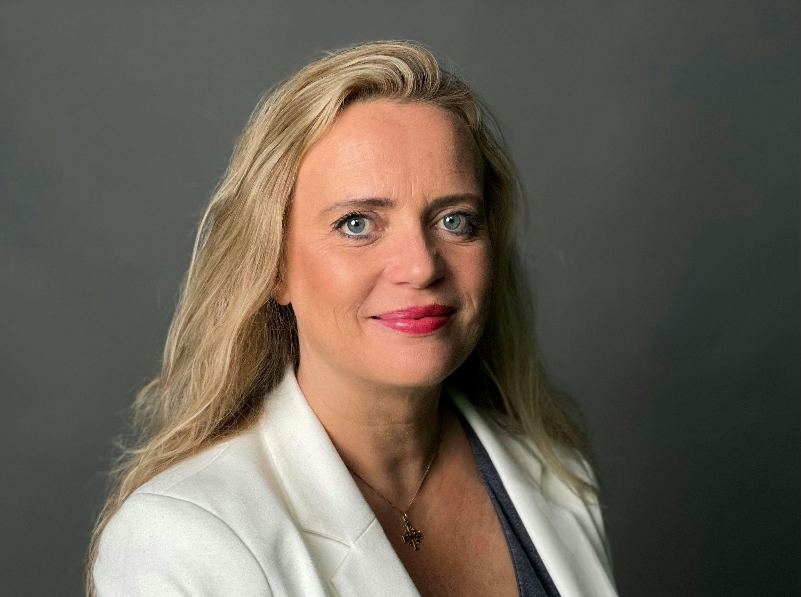 Profilbilde av en smilende Hilde Johanne Aafoss som er foredragsholder for Verdensdagen for psykisk helse 2024.